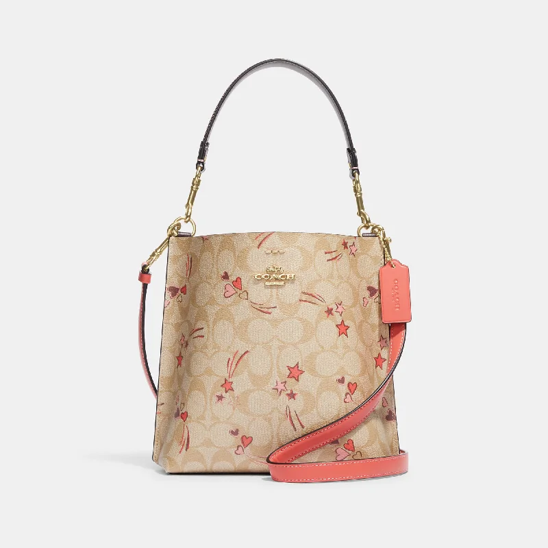 Coach Outlet Mollie Bucket Bag 22 In Signature Canvas With Heart And Star Print